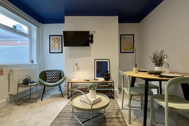 A Stylish And Inviting Large Modern Living Room, P...