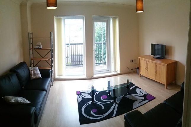 Bright, Modern Living Room With Recessed Balcony d...