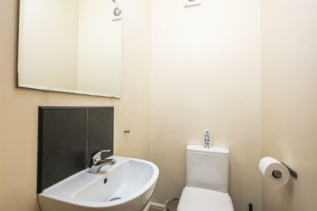 A Well-Maintained Single Toilet Featuring A Modern...