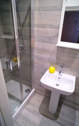 Modern Bathroom Featuring A Spacious Walk-In Showe...