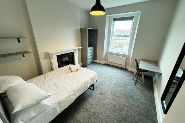 A Bright And Inviting Double Bedroom With Modern d...