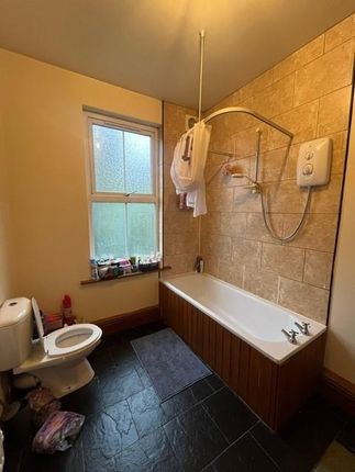 A Clean And Well-Maintained Bathroom Featuring A l...