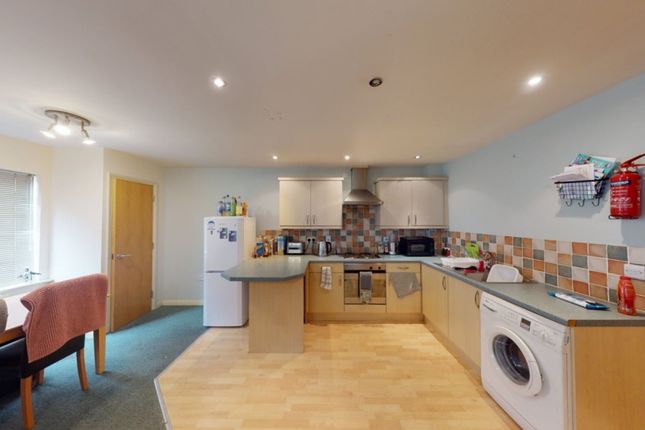 A Spacious And Tidy Kitchen With Modern Appliances...