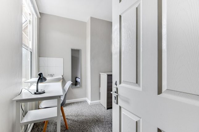 A Clean And Well-Maintained Bathroom Featuring A l...