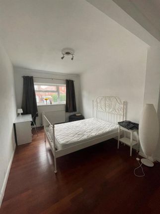 Bright And Inviting Double Bedroom With Ample Natu...