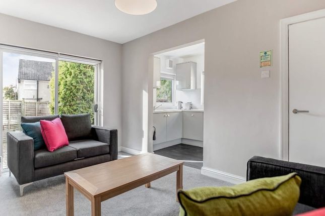 Bright, Modern Living Room With A Comfortable Two-...