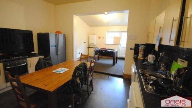 A Modern, Well-Lit Kitchen With Ample Workspace An...