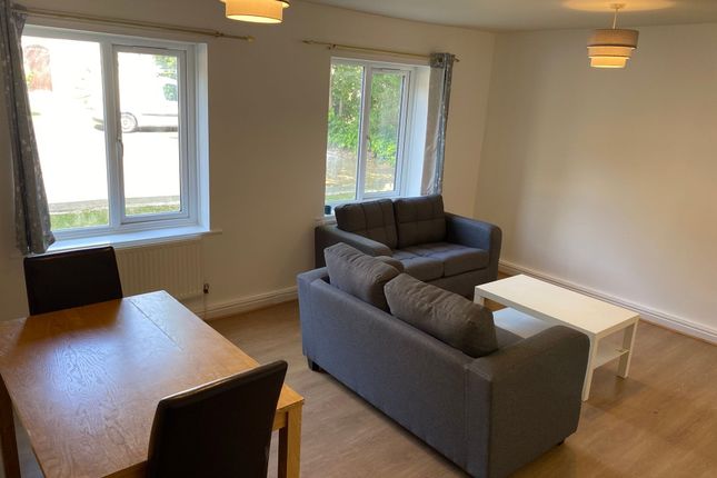 Bright, Modern Living Room With Two Grey Sofas, A ...