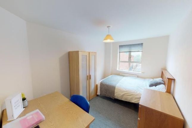 Bright And Cozy Single Bedroom Featuring A Comfort...