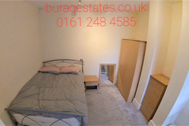 Cozy Single Bedroom Featuring A Neat Bed With Warm...