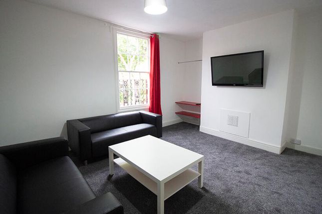 Bright And Modern Living Room Featuring Comfortabl...