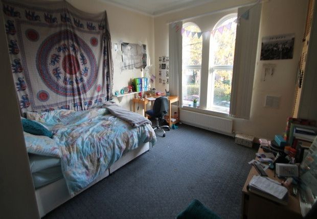 A Spacious Double Bedroom With A Large Bed, Ample ...