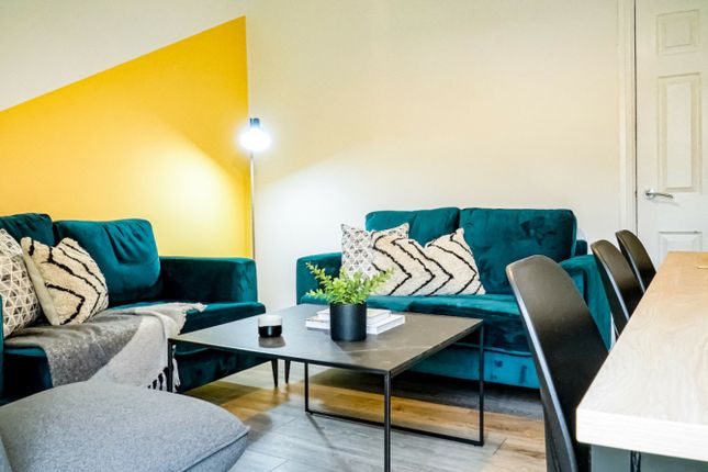 A Stylish And Inviting Large Modern Living Room, P...