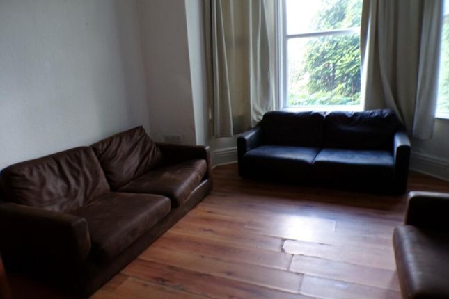 Spacious Living Room Featuring Comfortable Seating...