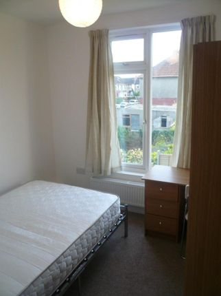 A Bright And Inviting Double Bedroom With Ample Na...