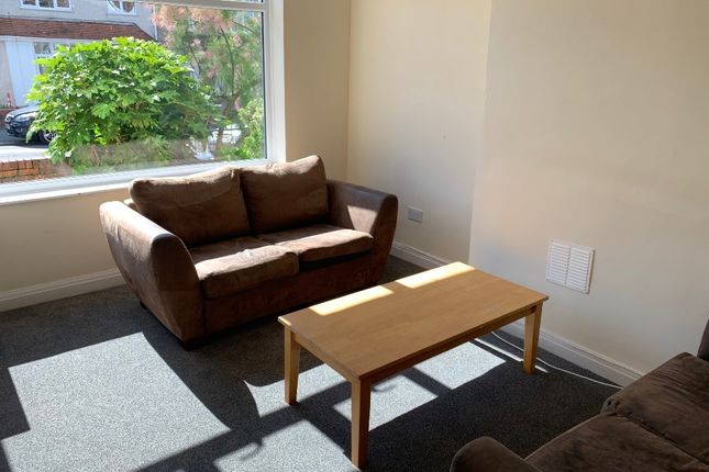 Bright Ground-Floor Living Room With Large Front W...