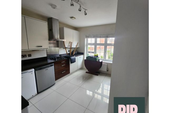A Spacious And Modern Kitchen Filled With Natural ...