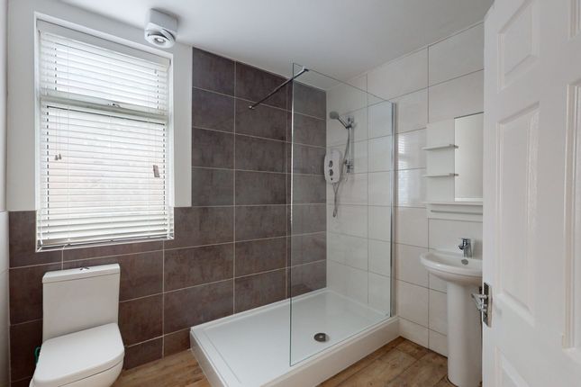 A Modern And Well-Maintained Bathroom Featuring A ...