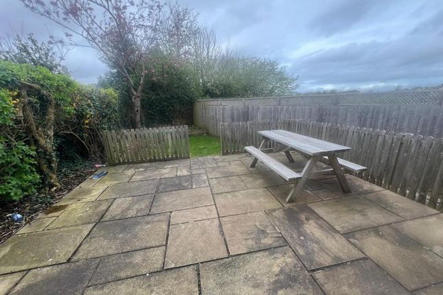 A Spacious Garden Area Perfect For Outdoor Relaxat...