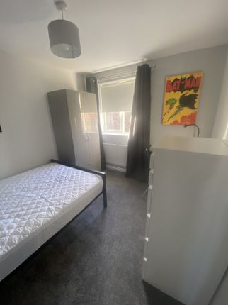 A Bright And Inviting Double Bedroom Featuring Mod...