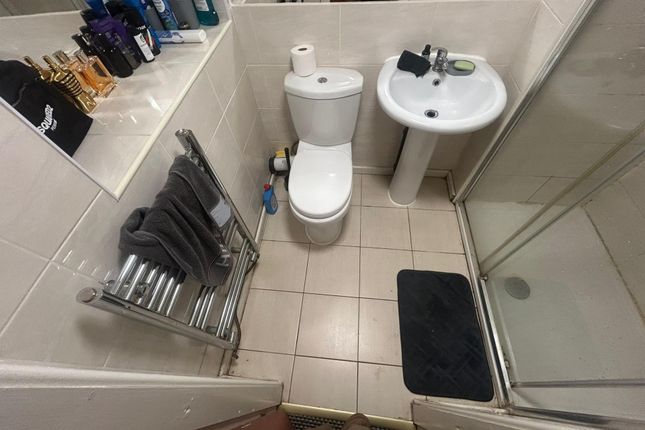 A Clean, Well-Maintained Bathroom Featuring A Toil...