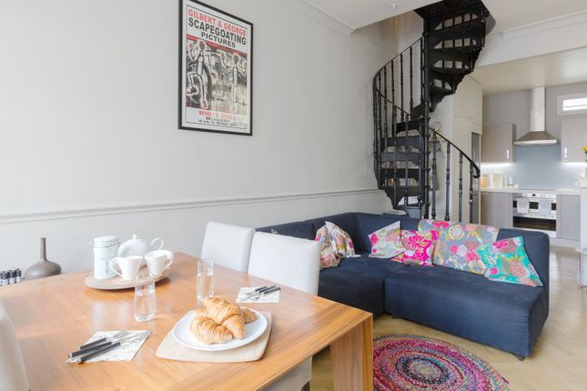Thumbnail Town house to rent in St. George's Square Mews, London