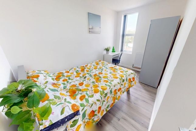 Bright And Airy Bedroom Featuring A Comfortable Do...