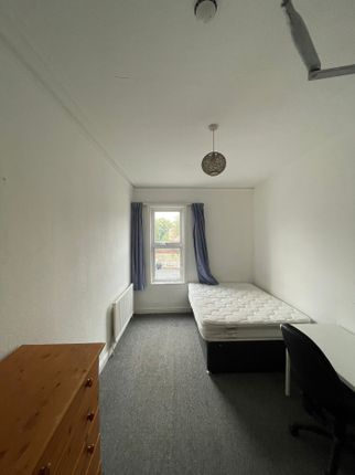A Spacious And Tidy Double Bedroom Featuring Natur...