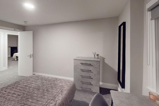 A Spacious And Tidy Double Bedroom With Modern Dec...