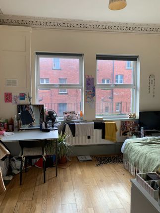 Bright Master Bedroom Featuring Large Windows That...