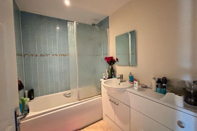 A Beautifully Designed Bathroom Suite Featuring A ...