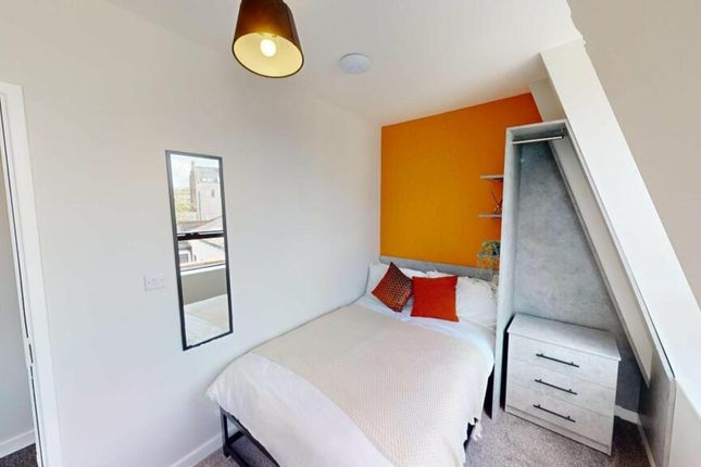 A Bright And Inviting Double Bedroom Featuring Mod...