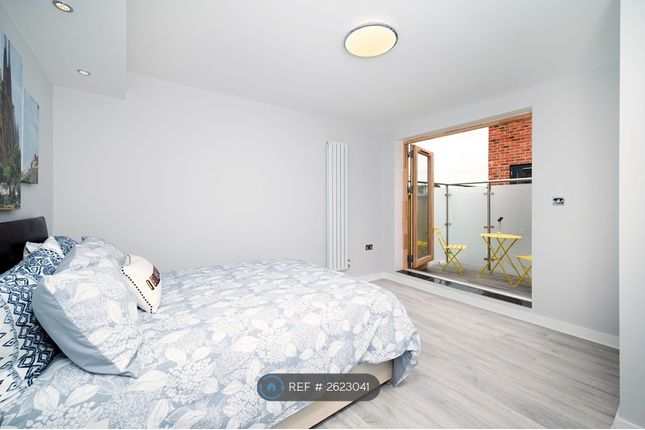 Bedroom With Balcony Access