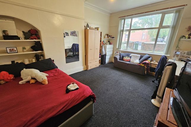 Spacious And Well-Lit Master Bedroom With A Comfor...