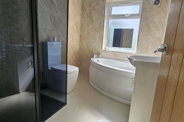 Experience A Beautifully Designed Bathroom Suite F...