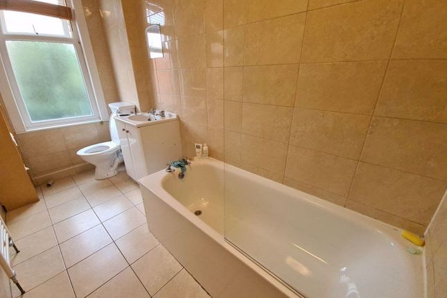 A Clean And Well-Maintained Bathroom With A Large ...