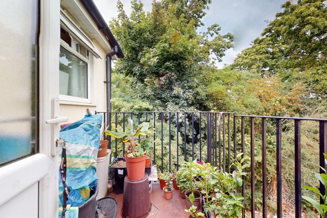 A Charming Balcony Garden Space Featuring Lush Gre...