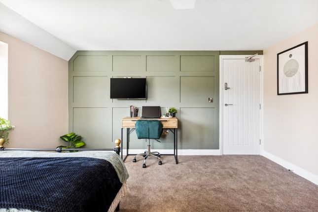 Stylish Double Bedroom Featuring A Cozy Ambiance W...