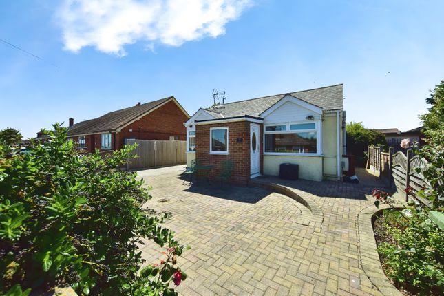 Outside View Of The Property With Driveway Parking