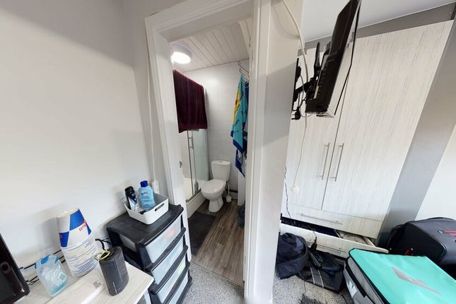 A Bright And Well-Maintained Bathroom With A Large...