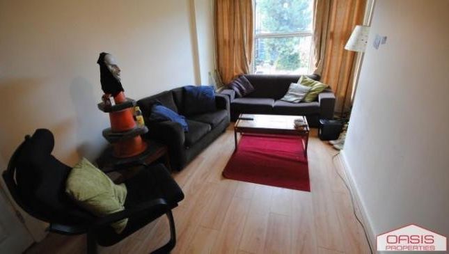 A Cozy Living Room Featuring Comfortable Seating A...