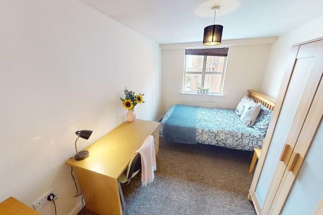 Bright And Tidy Single Bedroom Featuring A Comfort...
