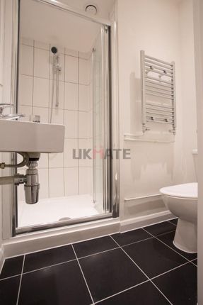 Modern And Clean Bathroom With A Shower Cubicle, W...