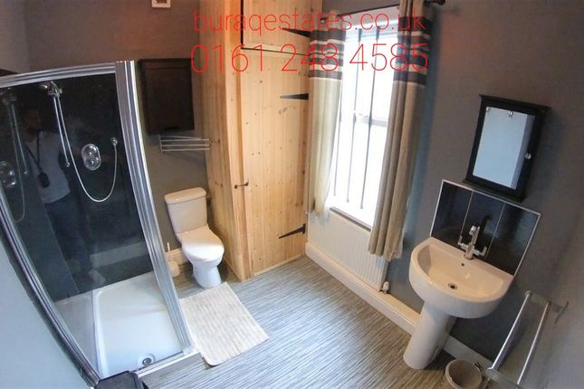 Bright And Modern Bathroom Suite Featuring A Spaci...