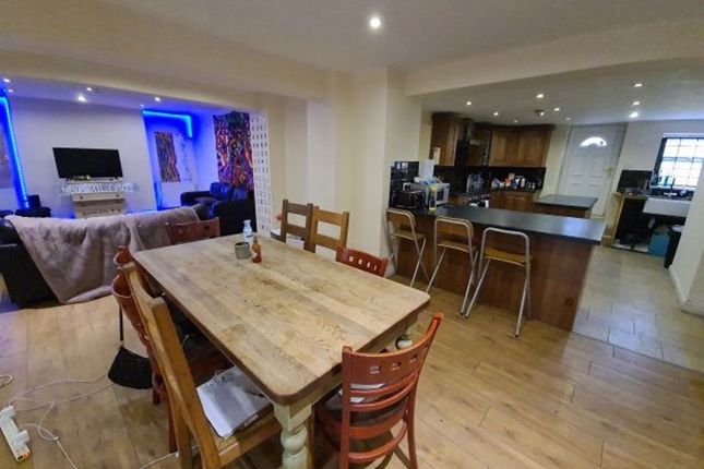 A Spacious And Modern Living Area With An Open-Pla...