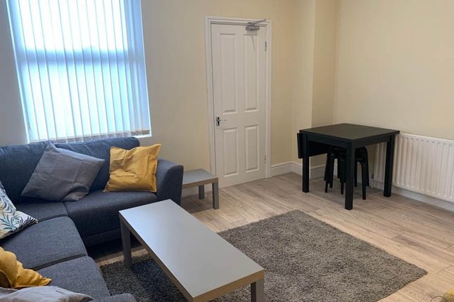 Bright, Well-Kept Living Room With A Comfortable G...