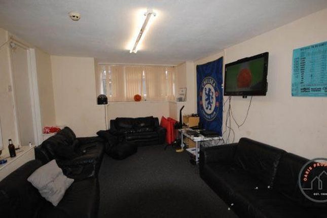 A Spacious, Modern Living Room With Ample Seating,...