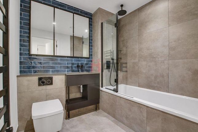 Modern, Clean Bathroom Featuring A Bathtub, Walk-i...