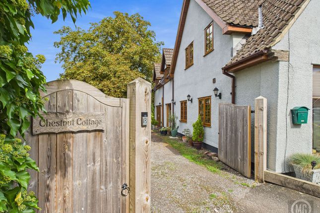 House Front With Gated Driveway
