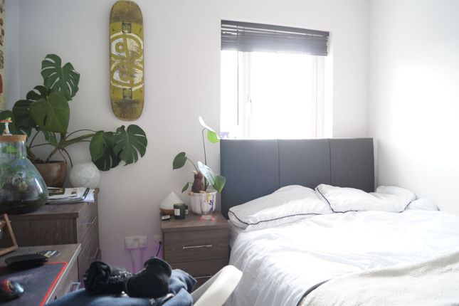 Cozy Double Bedroom Featuring A Comfortable Bed Wi...